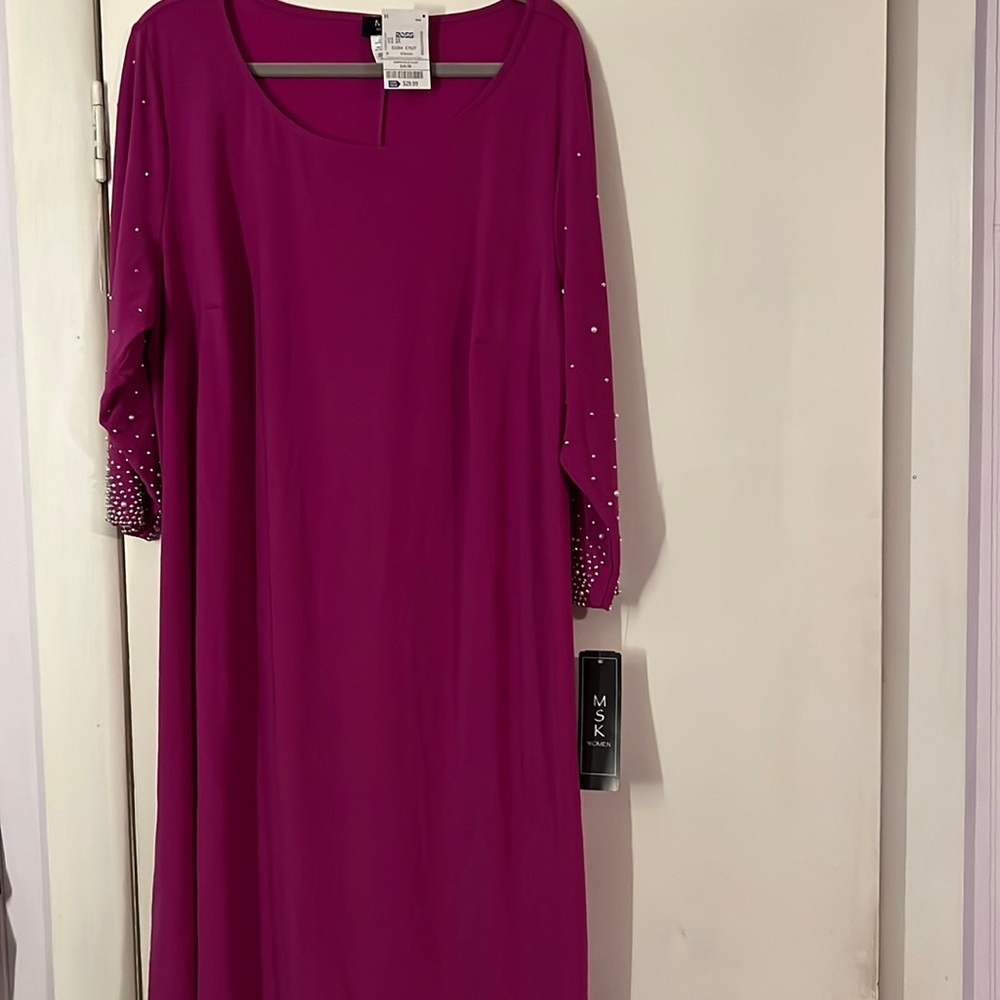 Pink dress with pearl and rhinestone embellishments